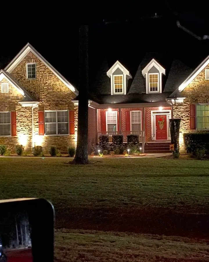 Professional low voltage landscape lighting vs solar lights comparison — Fayetteville NC installation